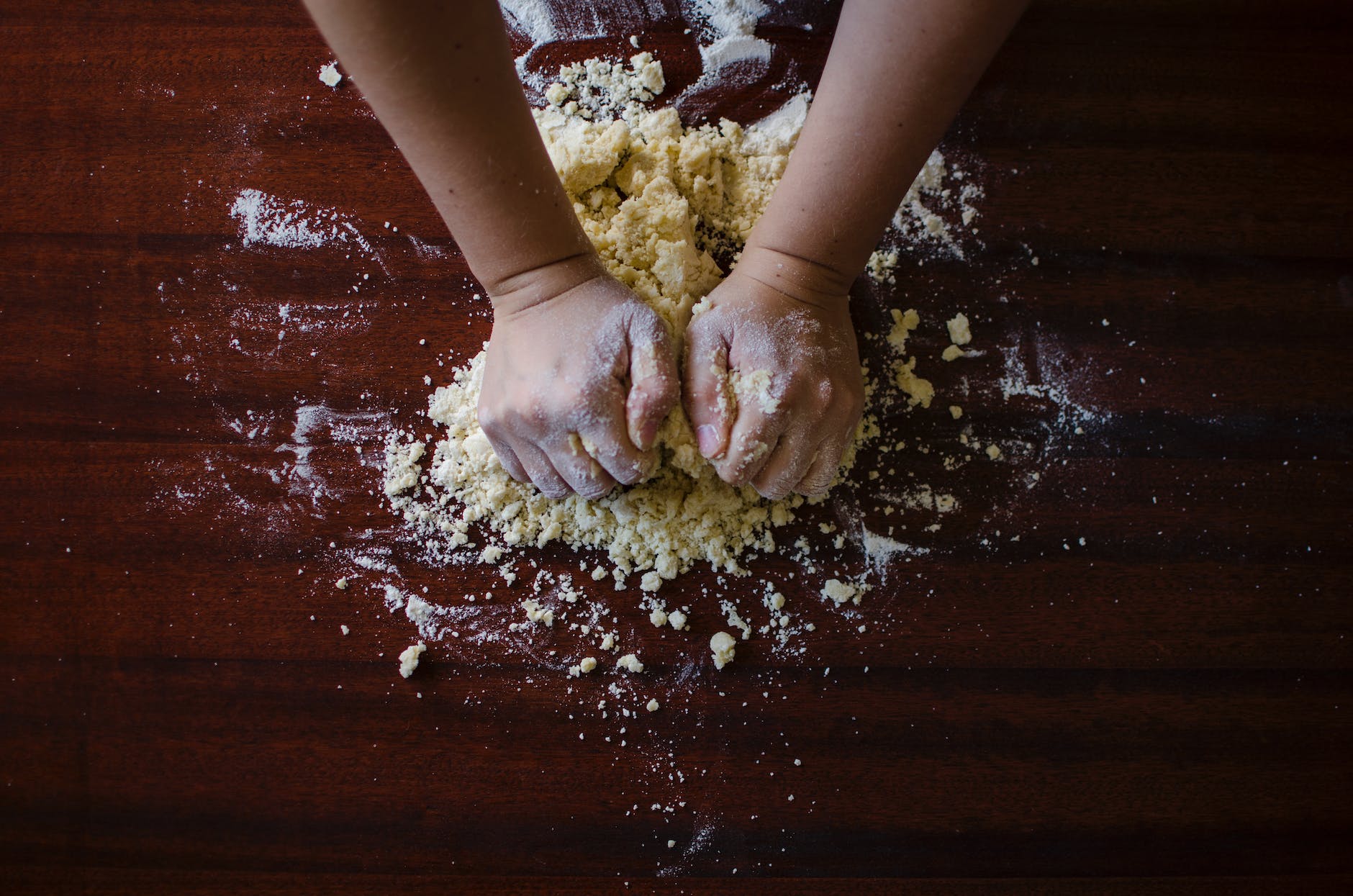 The picture shows a person mixing flour with water, to create a dish. This is a metaphor for mixing research methods to obtain more accurate conclusions.
